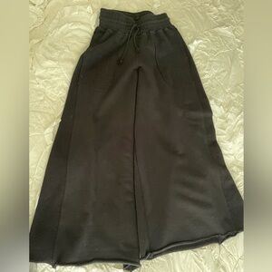 Barely worn. Black free people movement wide leg pant with side detail